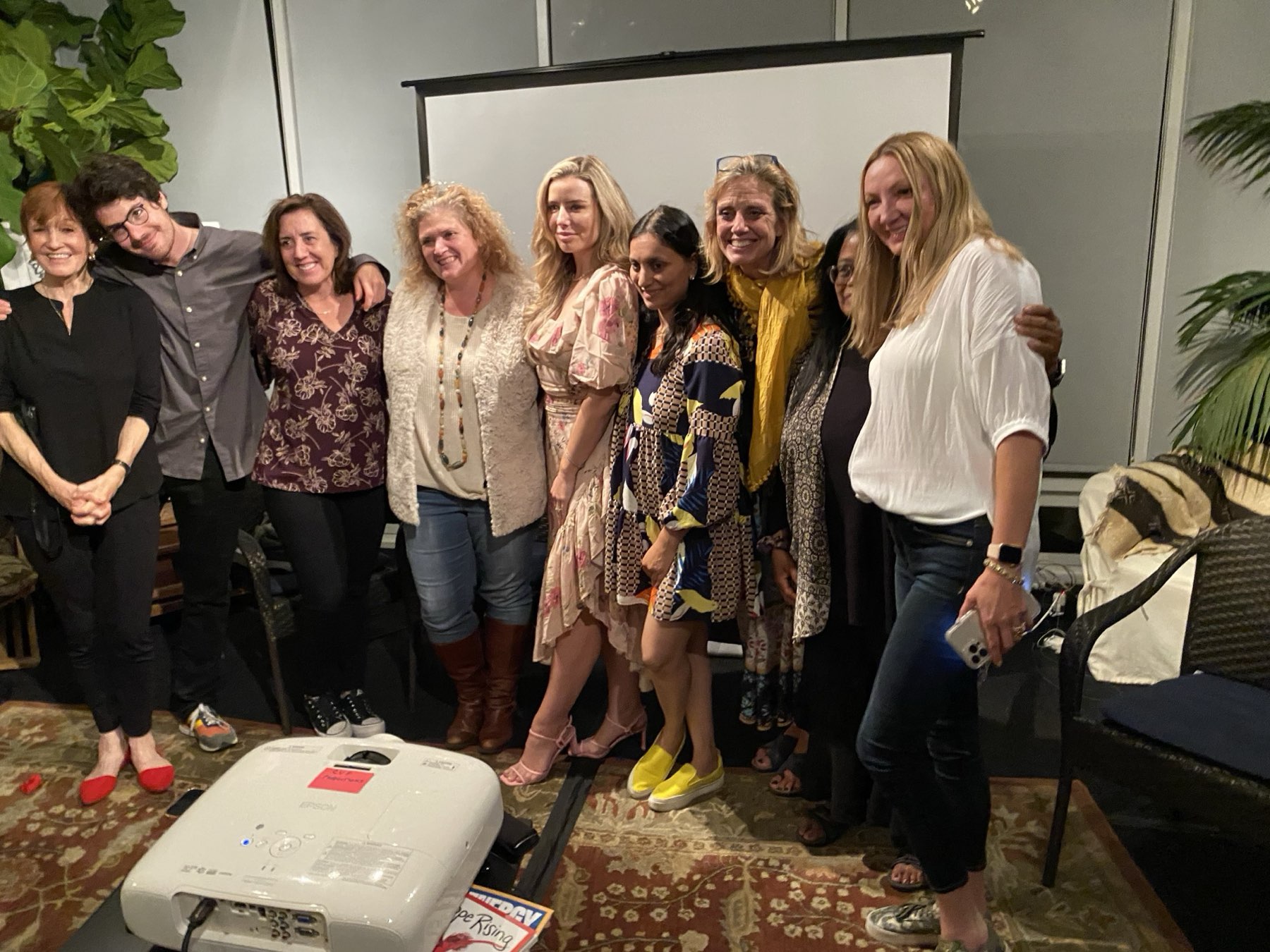 A gathering of women together after an evening’s conversation